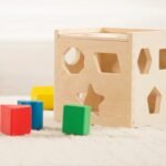 Melissa & Doug Shape Sorting Cube - Classic Wooden Toy With 12 Shapes - Image 10